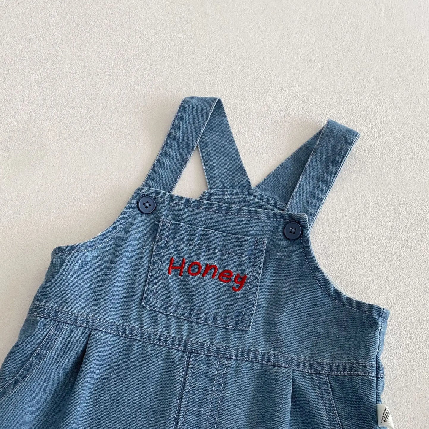 Camiseta de dibujos animados para bebé 2025, nuevo estilo de verano, camisa básica de Color contrastante a la moda para niño de 0 a 5 años, Top de oso para bebé a la moda