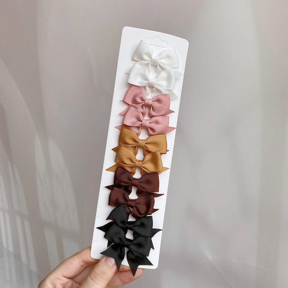 10 unids/lote de pinzas para el pelo con lazo de Color sólido para niñas, horquilla con lazo hecha a mano, Mini pasadores, accesorios para el cabello para niños