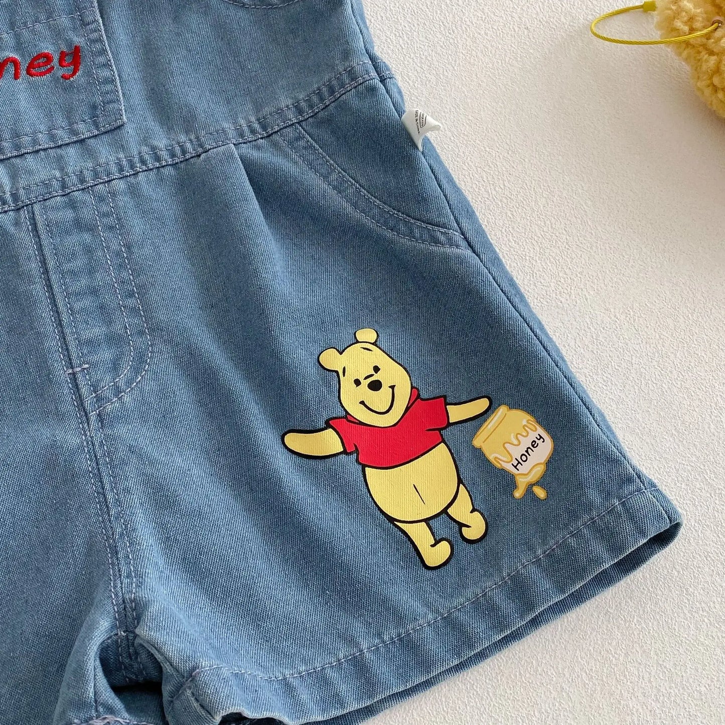Camiseta de dibujos animados para bebé 2025, nuevo estilo de verano, camisa básica de Color contrastante a la moda para niño de 0 a 5 años, Top de oso para bebé a la moda