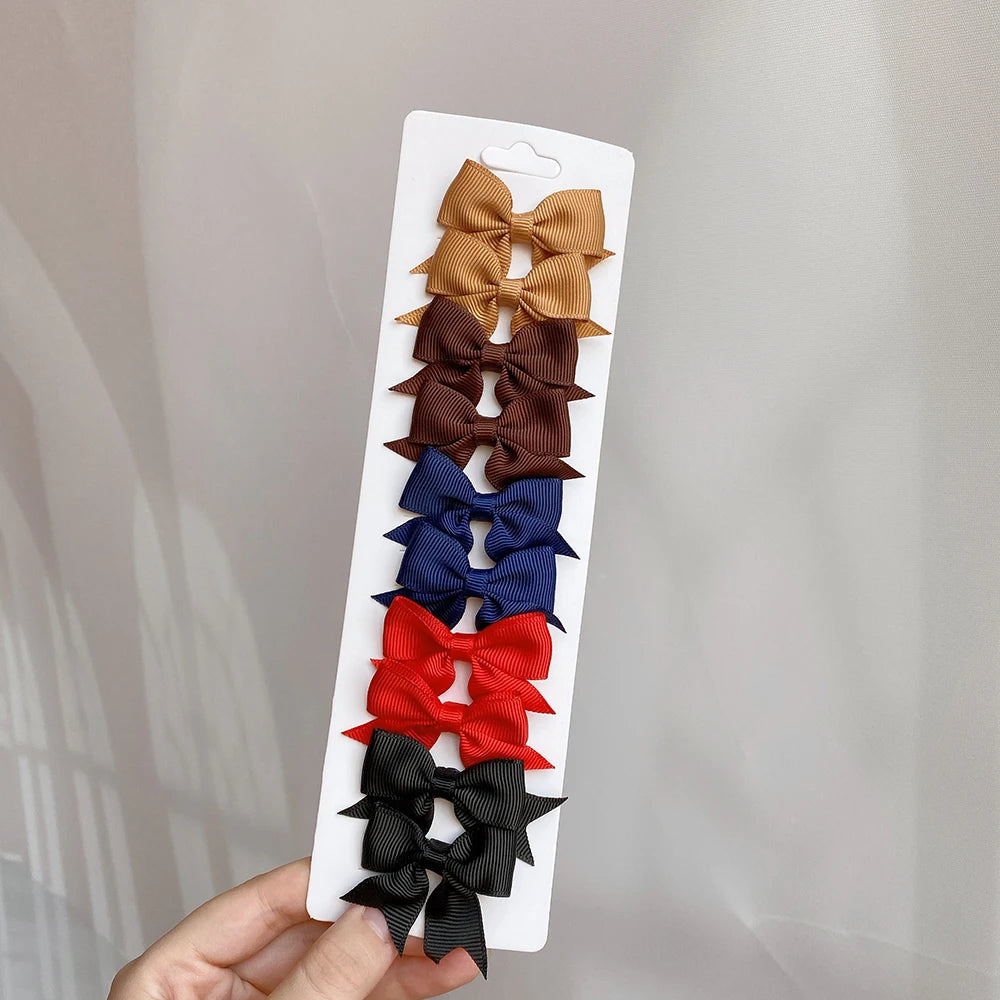 10 unids/lote de pinzas para el pelo con lazo de Color sólido para niñas, horquilla con lazo hecha a mano, Mini pasadores, accesorios para el cabello para niños